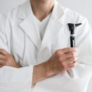 staff_introduction_image_professional-holding-otoscope@2x-1024x637